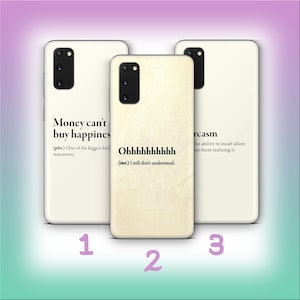 May include: Three white phone cases with humorous text. The first case reads "Money can't buy happiness" with a definition. The second case says "Ohhhhhhhhhh" with a definition. The third case says "Sarcasm" with a definition.