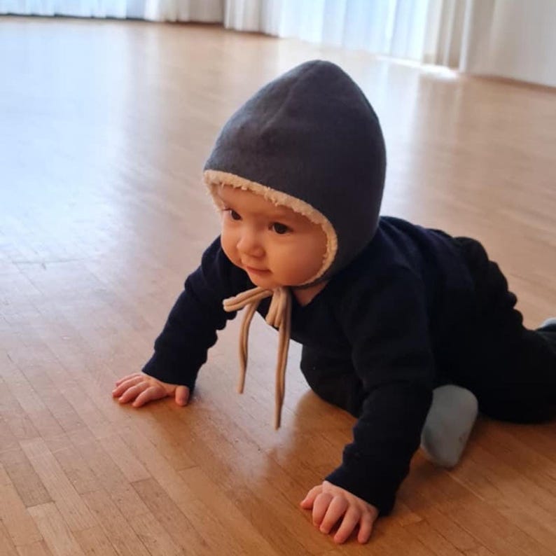 Babyullmössa i italiensk jungfruull, foder i ekologisk bomull bild 4