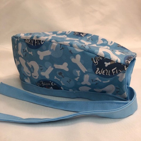 You break 'em, We fix 'em bone themed lined surgical scrub cap for men and women