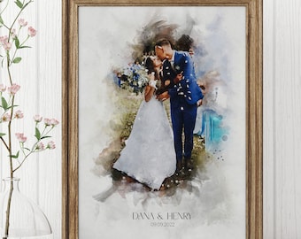 May include: A watercolor painting of a bride and groom kissing. The bride is wearing a white dress and the groom is wearing a blue suit. The painting is set against a blurred background of a garden. The text "Dana & Henry 09.09.2022" is printed below the couple.