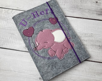 U-book cover elephant with heart balloon