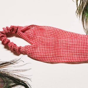 May include: Red and white gingham headband with a stretchy elastic band.