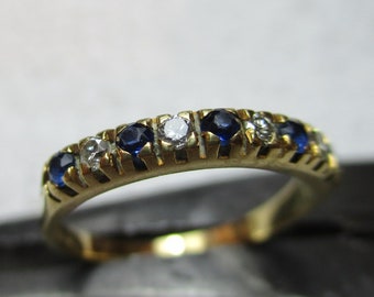 Vintage{Londen 1979} 18kt massief gouden diamant + saffier edelsteen 'Half Eternity Ring'