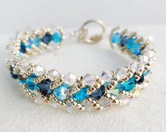 Blue Crystal Hand Beaded Bracelet With Clear Crystal Accents And Silver Seed Bead Edging