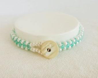 Soft Turquoise Blue Hand Beaded Bracelet With Pearl Seed Bead Edging And Antique Pearl Button Clasp