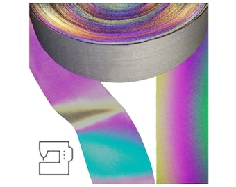 Peut inclure: Un rouleau de ruban holographique iridescent aux nuances de violet, bleu et vert. Le ruban est présenté déroulé et convient aux projets de couture.