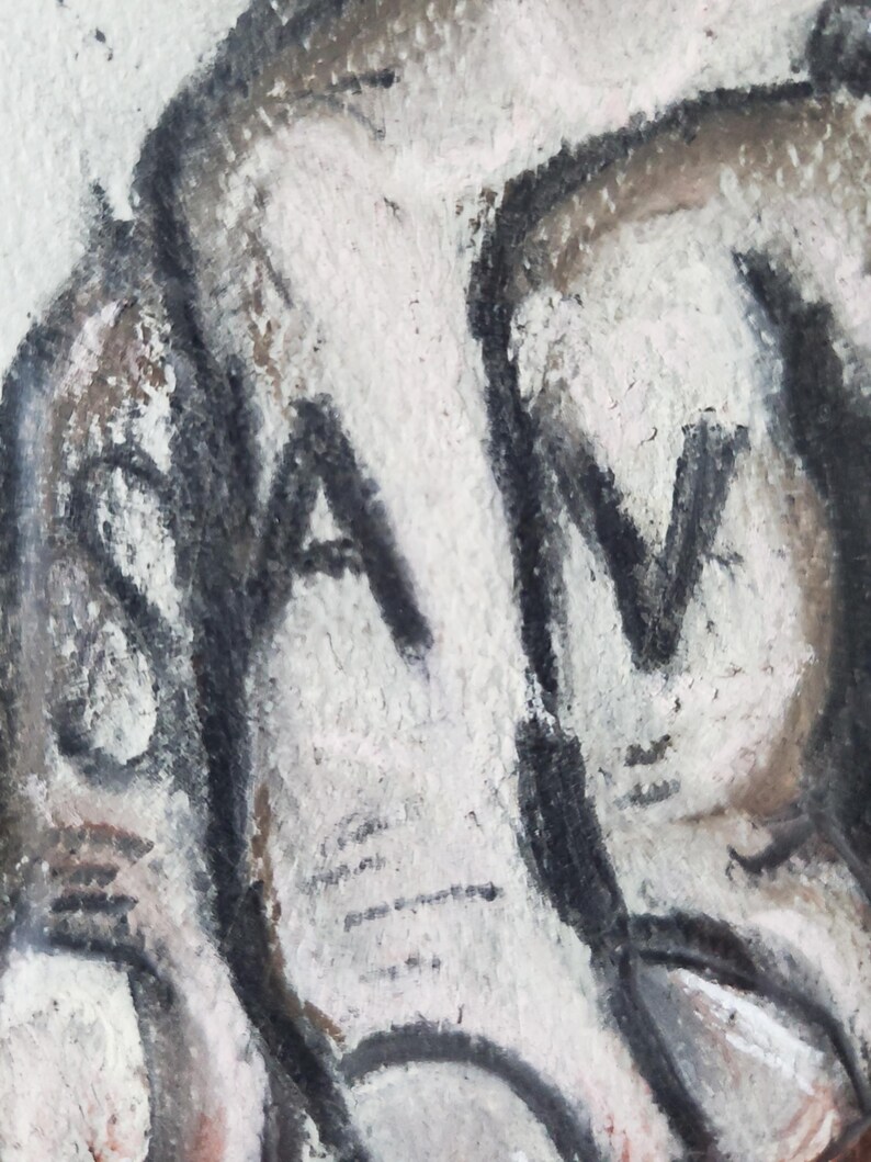 May include: A close-up of a black and white drawing of an elephant's trunk with the word "SAV" written on it.
