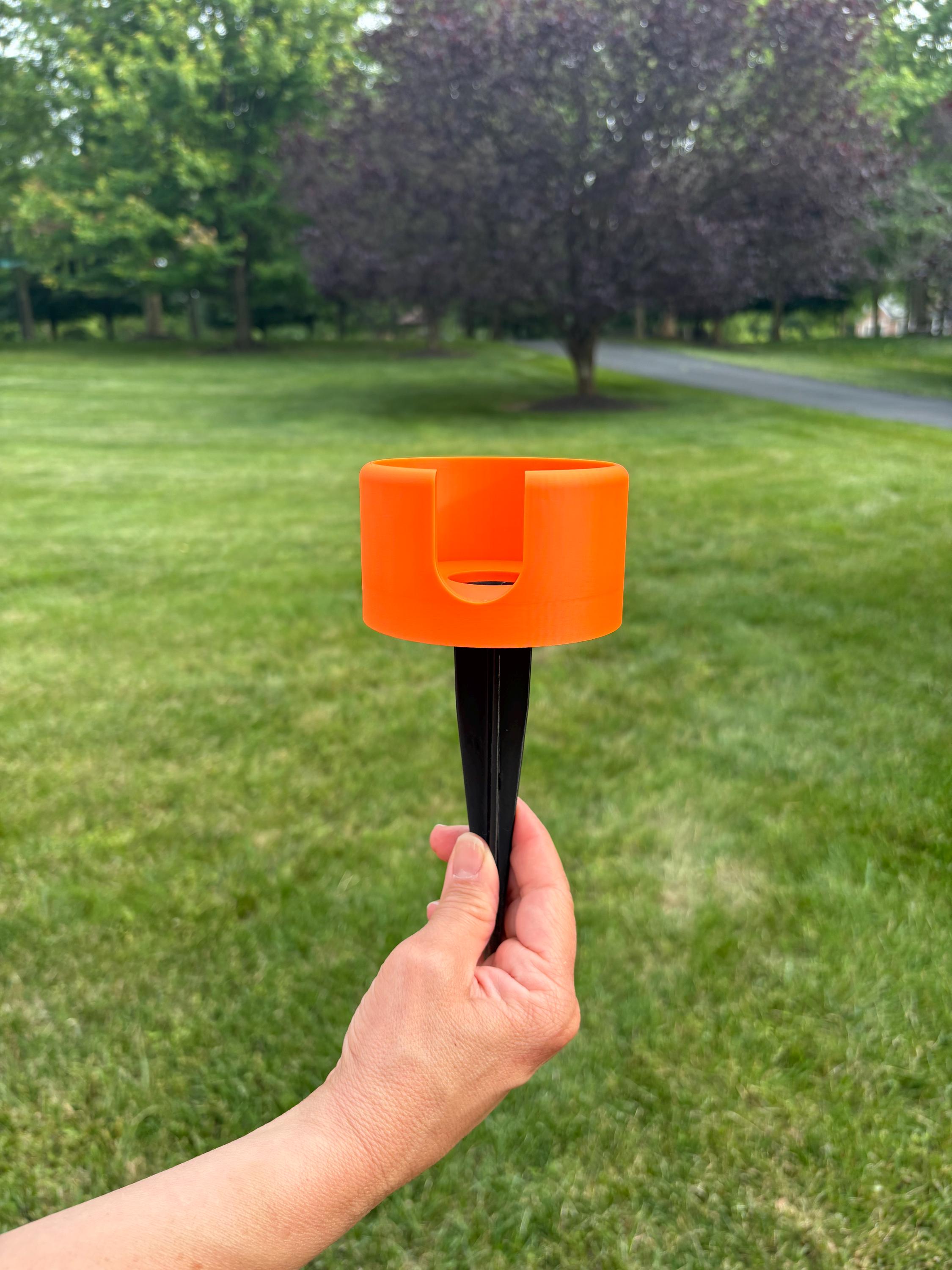 Stake Your Sip! Outdoor Drink Holder & Coaster With Grounded Spike (Orange)