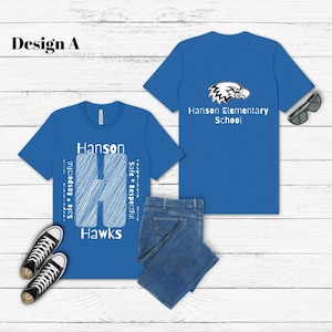 May include: Two blue t-shirts with the text "Hanson Hawks" and the school logo. One shirt displays the text "Hanson" and "H" with the words "Safe * Respectful" on the sides. The other shirt has the school logo and the text "Hanson Elementary School".