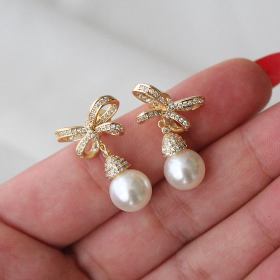 Pearl Bow Drop Stud Earrings With Cubic Zirconia- Dangle