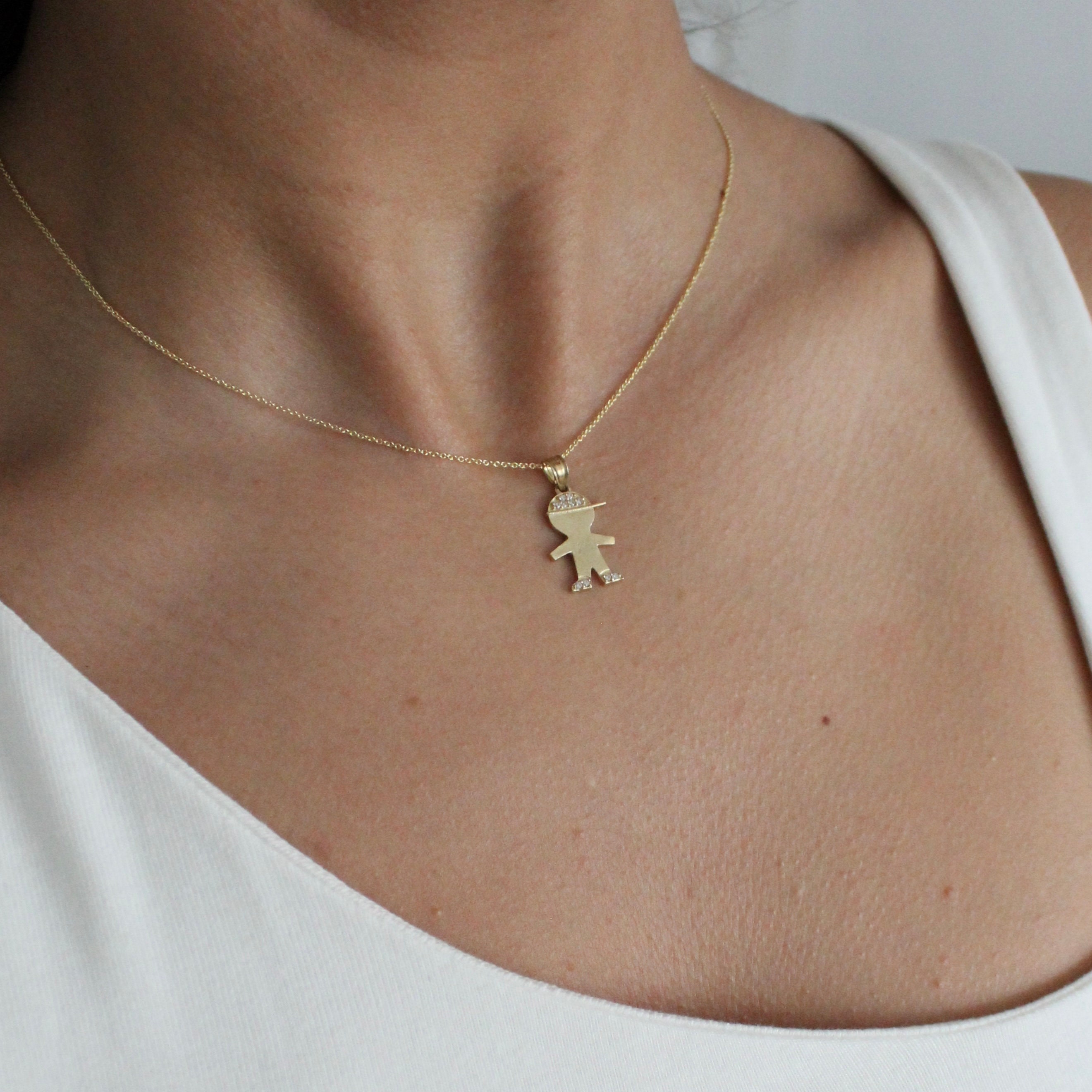 Gold locket for baby boy price clearance