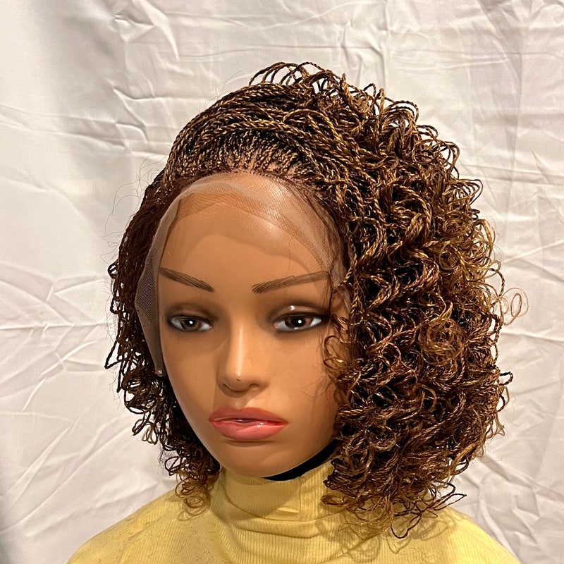 Crisp Human Braided Wigs Wallpaper for Your Screen