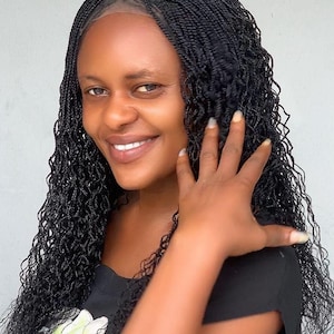 ElegantWigs 18-20 inches long.Braided Twist Wig Made on a Lace Closure **Just As Pictured*The color is black..Ready to ship.