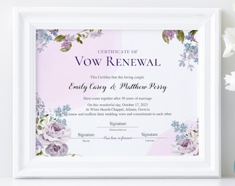 May include: A certificate of vow renewal for Emily Carey and Matthew Perry, dated October 17, 2023, with floral designs in shades of purple and blue.