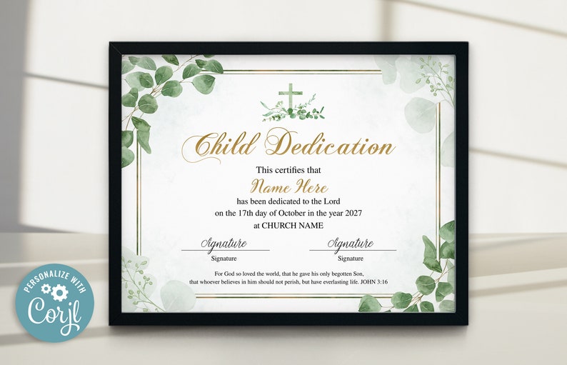May include: A framed Child Dedication certificate with a black frame. The certificate has gold lettering and a cross graphic. Green eucalyptus leaves and watercolor accents decorate the edges. The text includes "Name Here" and "CHURCH NAME".