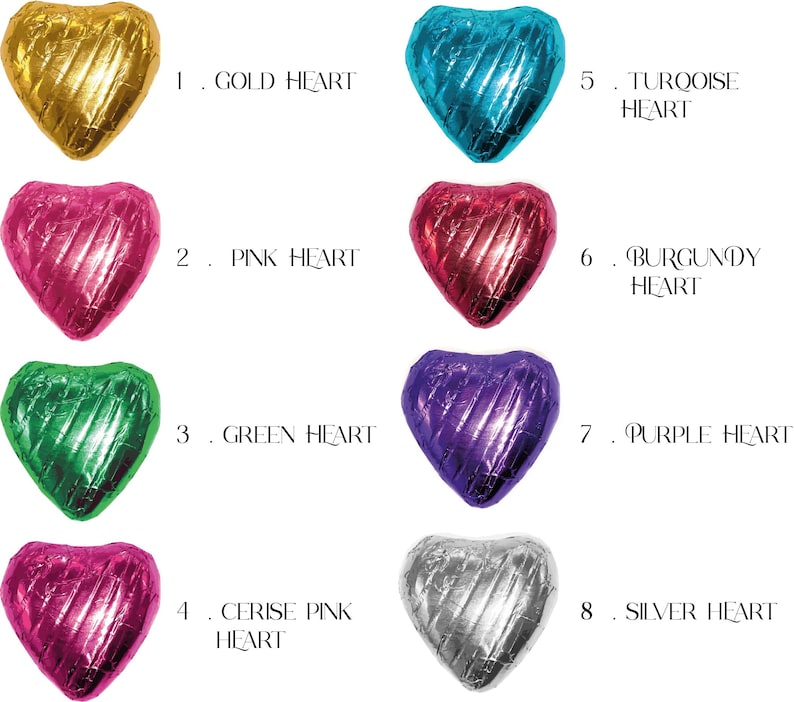May include: Eight heart-shaped chocolates wrapped in foil, each a different color: gold, pink, green, cerise pink, turquoise, burgundy, purple, and silver. The chocolates are numbered 1 through 8.