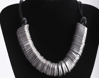 Handmade necklace, sustainable jewelry, eco-friendly accessory, unique fashion, aluminum can tabs, black rubber, statement piece