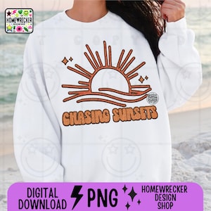 May include: White sweatshirt with a graphic of a sunset with waves and the text "Chasing Sunsets" in orange.