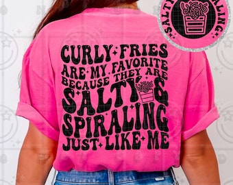 May include: A vibrant pink t-shirt featuring the words "Curly Fries Are My Favorite Because They Are Salty & Spiraling Just Like Me" in a black, retro style. A circular graphic on the back says "Salty & Spiraling" with a fries illustration.