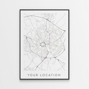 May include: Black and white line art print of a city map with the text "YOUR LOCATION" at the bottom.