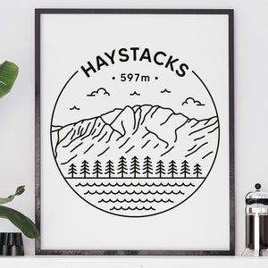 May include: Black and white line art print of a mountain range with the text "HAYSTACKS - 597m -" in a circle.