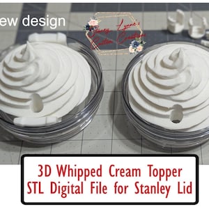 May include: Two clear containers with white 3D-printed whipped cream toppers. The toppers have a realistic swirl design. The image also includes the text "New design" and "3D Whipped Cream Topper STL Digital File for Stanley Lid."