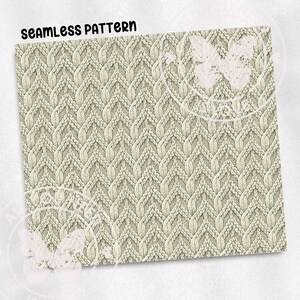 a close-up view of a knitted fabric with a repeating diagonal pattern.