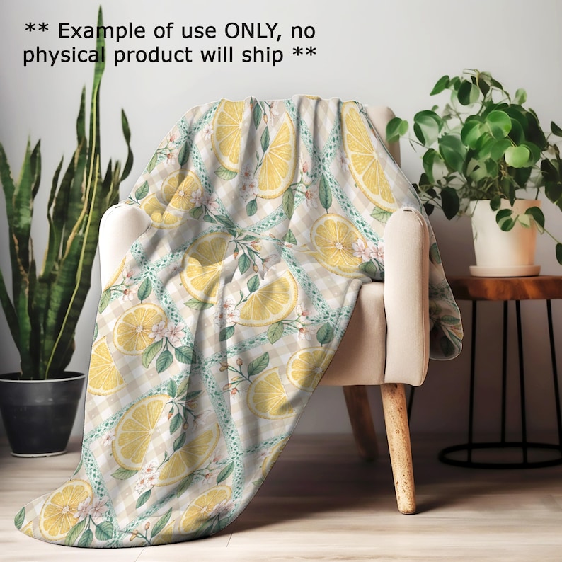a cozy indoor setting with a chair, a potted plant, and a decorative throw blanket with a lemon and leaf pattern.