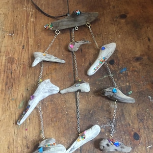 Driftwood duck heads windchime