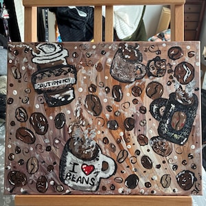 May include: Acrylic painting on canvas featuring coffee-themed imagery. The artwork includes coffee beans, mugs, and the text "CAUTION HOT" and "I ❤️ BEANS". The color palette consists of browns, whites, and reds.