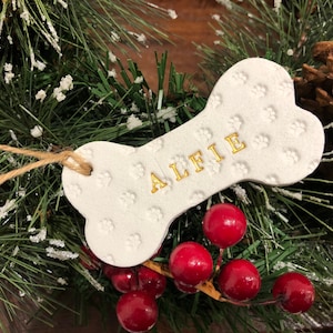 Dog Christmas Decoration - Bone Bauble - White Clay Paw Prints - Dog Bone - Jute Twine