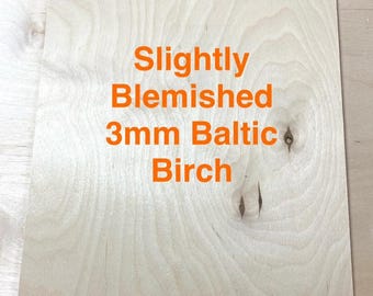 May include: A close-up of a sheet of 3mm Baltic birch plywood with a slightly blemished surface. The plywood is light brown in color and has a natural wood grain pattern.