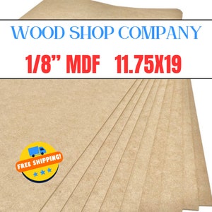 May include: A stack of 1/8 inch MDF wood sheets, measuring 11.75 by 19 inches. The sheets are light brown and have a rough texture. The text "WOOD SHOP COMPANY" and "FREE SHIPPING!" is printed on the top sheet.