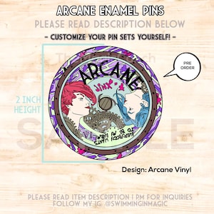 May include: A 2-inch tall, round, enamel pin featuring a colorful design of two characters from the show Arcane. The pin is purple, blue, green, and pink with a black outline. The text "Arcane" and "Jinx" are visible on the pin. The pin is available for pre-order.