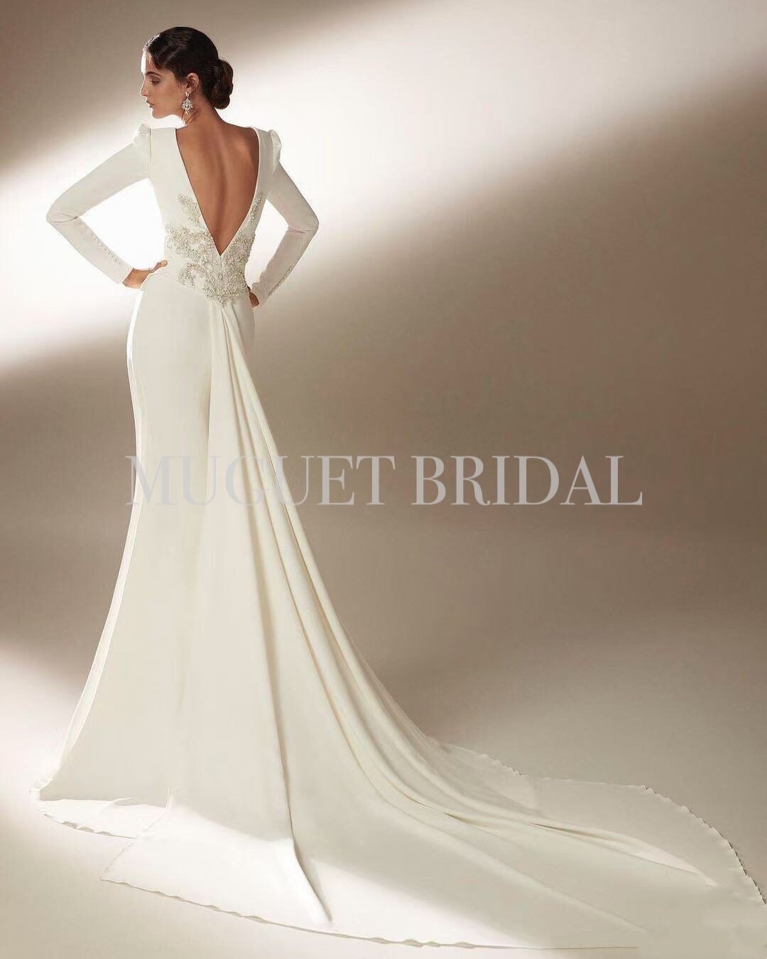 LONG-SLEEVE FIT-AND-FLARE WEDDING DRESS WITH DEFINED BUSTLINE