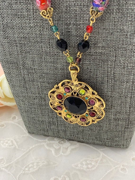 Signed glass bead and pendent necklace