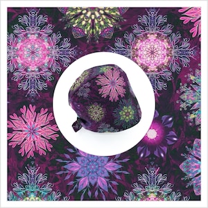 May include: A purple surgical scrub cap with a floral pattern in pink, green, and blue. The cap is set against a background of a similar floral design in shades of purple and white.