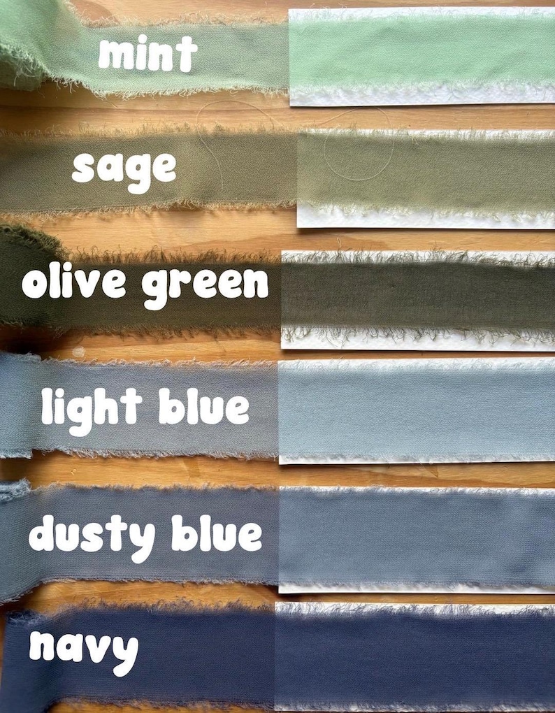 May include: A selection of fabric ribbons in various colors, including mint, sage, olive green, light blue, dusty blue, and navy. Each ribbon has a frayed edge and is labeled with its corresponding color name in white text.