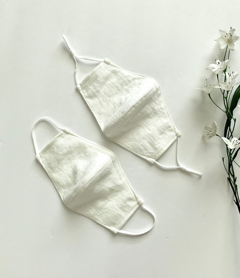This face mask is made of OEKO-TEX certified linen fabric, which is free from harmful toxins and chemicals. These face masks are made of 3 layers with filter pockets on both sides and nose wire.  The elastics are soft and adjustable.