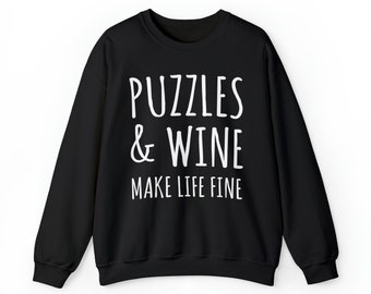 May include: Black sweatshirt with white text that reads "Puzzles & Wine Make Life Fine".