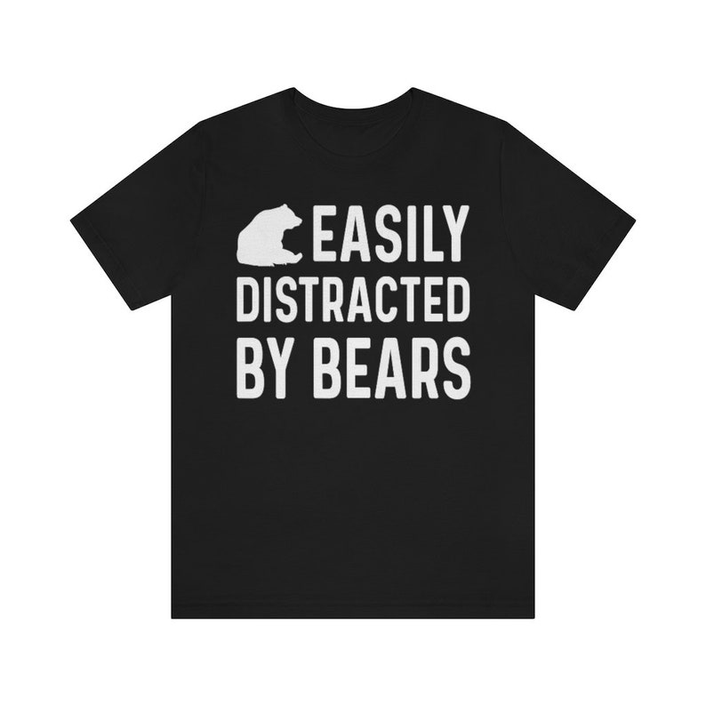 May include: Black t-shirt with a white bear silhouette and the text "EASILY DISTRACTED BY BEARS".