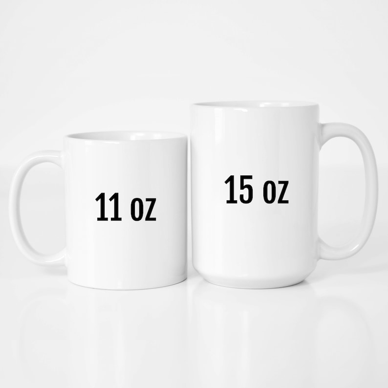 May include: Two white ceramic mugs, one 11 oz and one 15 oz.