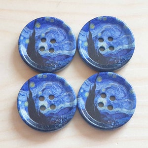 May include: Four round buttons featuring a printed design of a swirling blue night sky with yellow stars and a dark silhouette of a cypress tree. Each button has four holes in the center for attachment, with a smooth finish and a circular shape.