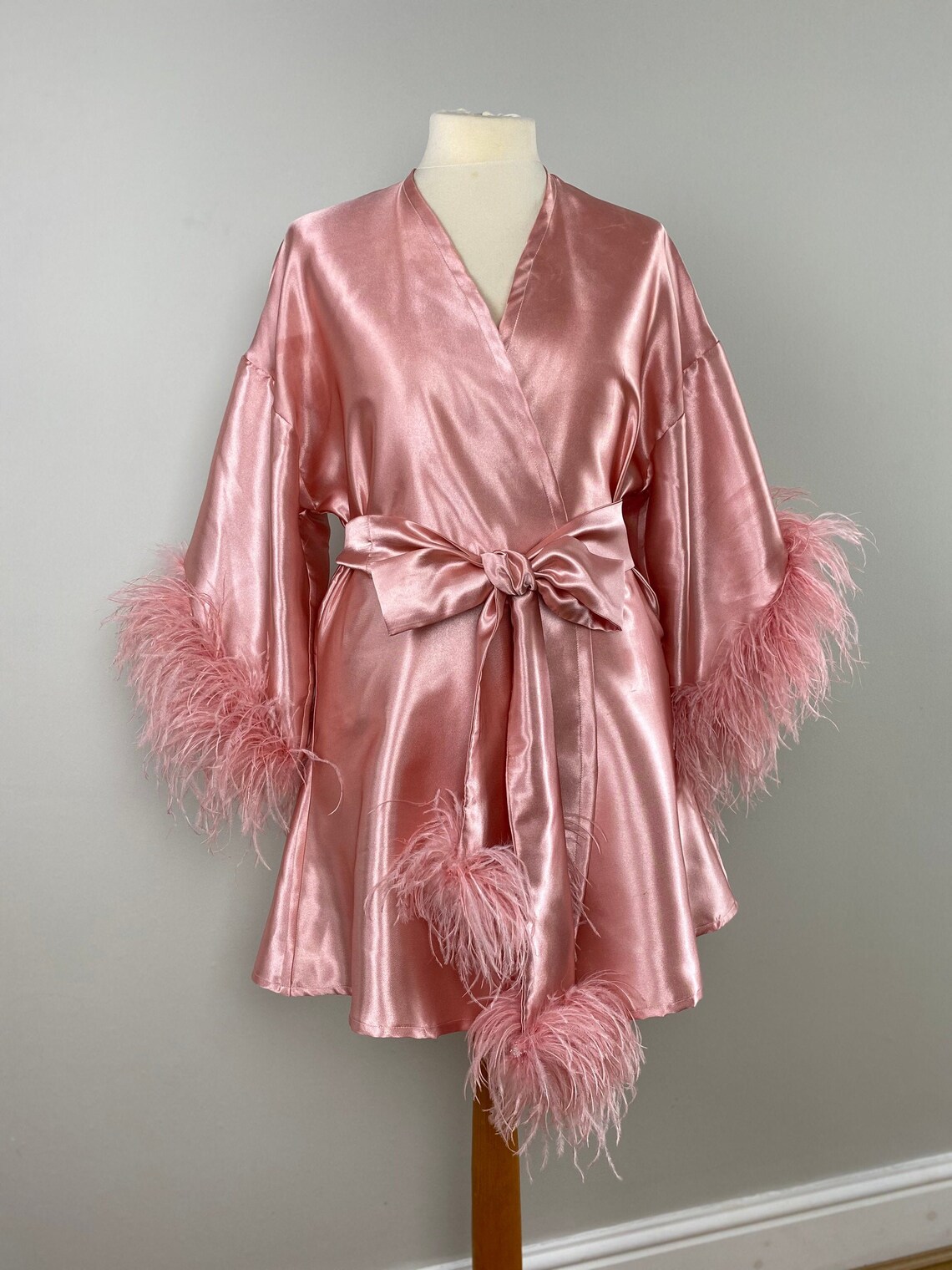 pink silk robe with feathers