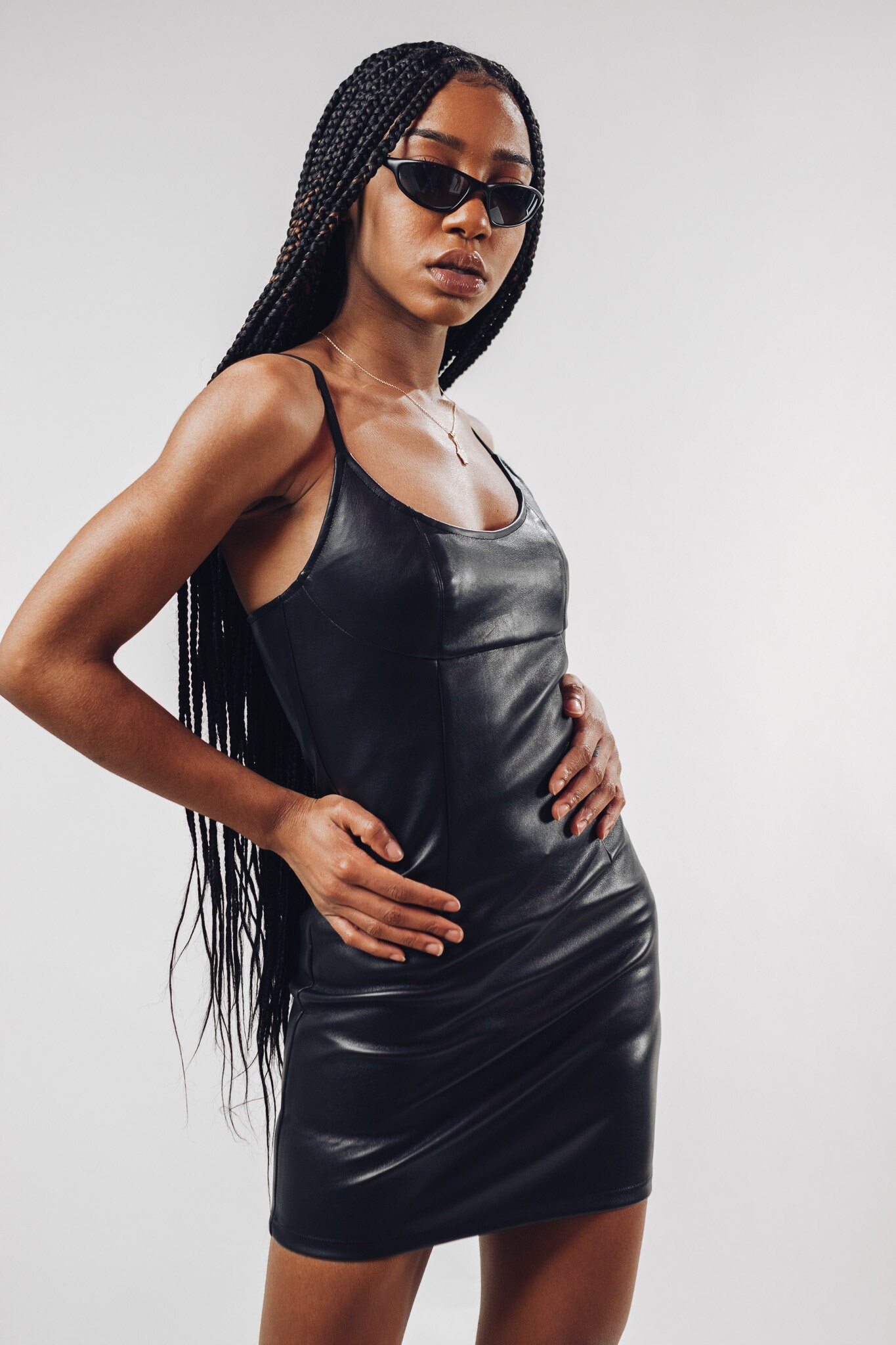 Black Pleather Mini Dress: Adjustable Straps, Flattering Cut