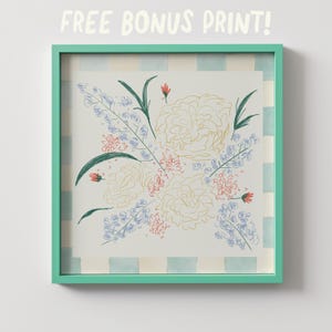 May include: A framed floral print with a mint green frame. The artwork features a bouquet of sketched flowers in cream, red, blue, and green. The text "FREE BONUS PRINT!" is at the top.