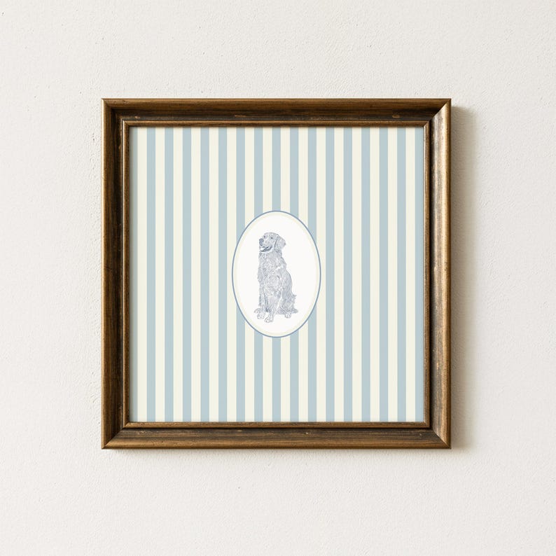 May include: Framed artwork featuring a seated dog illustration within an oval frame. The dog is depicted in a detailed, sketched style. The background has vertical stripes in light blue and cream colors. The frame is a dark brown color.