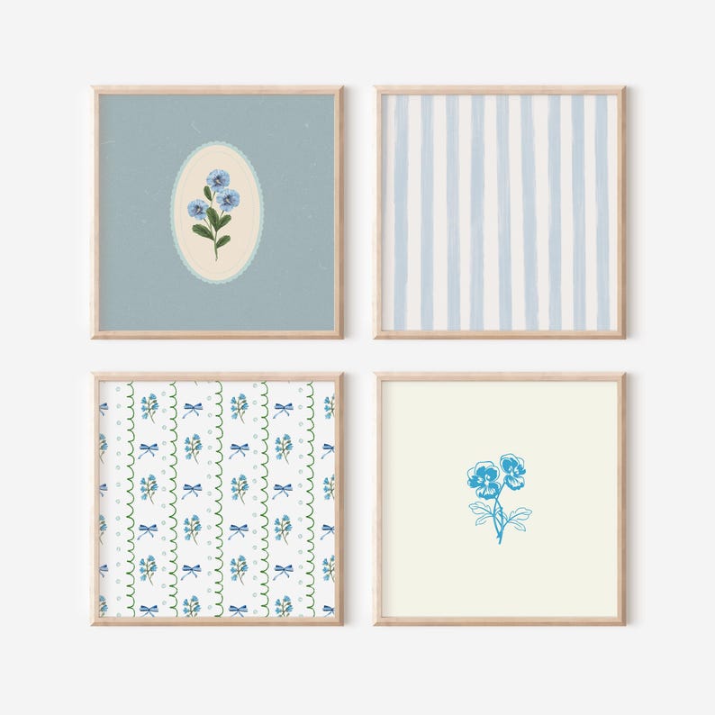 May include: Set of four framed prints with a blue and white floral theme. The prints feature a single flower in a frame, a striped pattern, a floral pattern, and a single flower.
