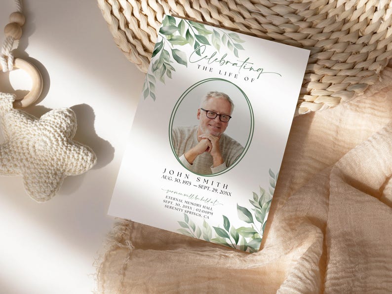 May include: A white memorial card with green watercolor leaves and a photo of a man in a white shirt. The text reads "Celebrating the Life of John Smith Aug. 30, 1975 - Sept. 29, 20XX  you will be missed" and includes information about a memorial service.