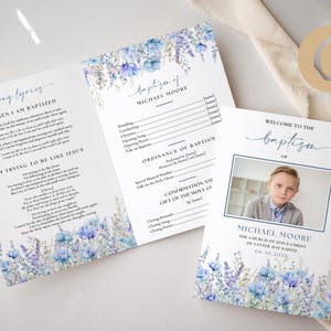 May include: A blue and white baptism program with a floral design and a photo of a young boy. The program includes the order of service, song lyrics, and the text "Welcome to the Baptism of Michael Moore".